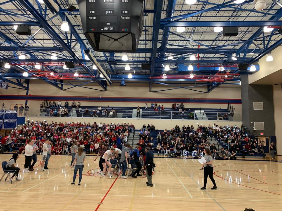 Two students from each grade went into the center of the gym for Musical Chairs, a game where the number of chairs is purposefully one less than the number of players. The winner of this game was Emma Myers, a junior. 