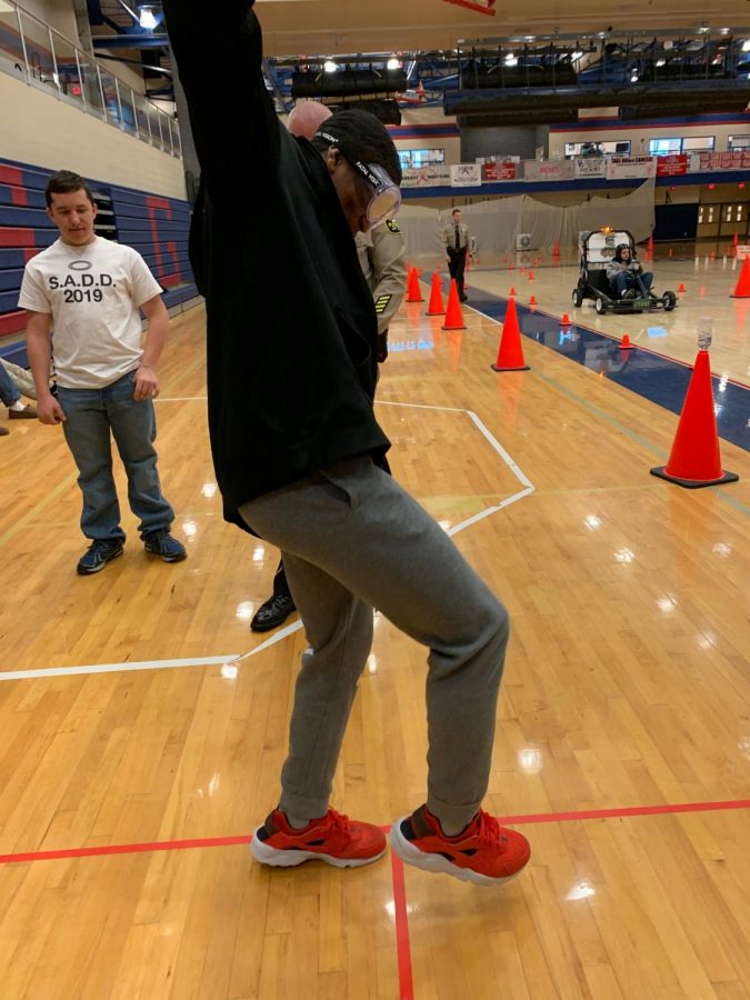 At Safety Day, there were goggles students could put on that simulated the experience someone would have to go through if they were pulled over by an officer for drunk driving. Students were trying their hardest to walk in a straight line, but most failed.