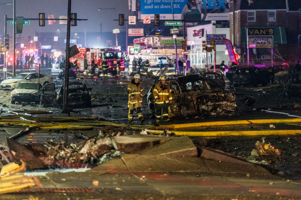 PHILADELPHIA, UNITED STATES - JANUARY 31: A view of the wreckage from a small plane after it crashed in a residential area in the US city of Philadelphia on January 31, 2025. The aircraft, reportedly an air ambulance, took off from the Northeast Philadelphia Airport when went down around 6.30 p.m. local time (2330GMT), igniting multiple fires. (Photo by Thomas Hengge/Anadolu via Getty Images)