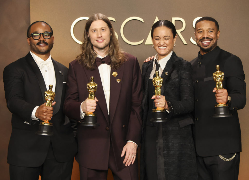 Ryan Coogler, winner of the Oscar for Best Original Screenplay, Ludwig Goransson, winner of the Oscar for Best Original Score, Autumn Durald Arkapaw, winner of the Oscar for Best Cinematography and Michael B. Jordan, winner of the Oscar for Best Actor, for "Sinners" pose in the Oscars photo room at the 98th Academy Awards in Hollywood, Los Angeles, California, U.S., March 15, 2026. REUTERS/Mario Anzuoni